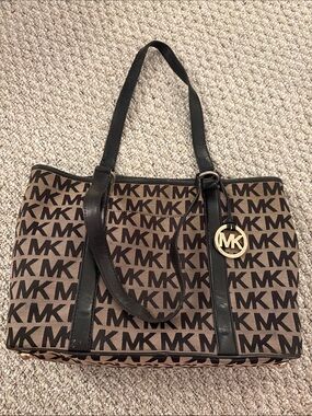 Michael Kors Brown Monogram Canvas Tote with Gold Charm